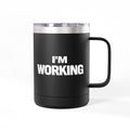 Black mug with 'I'm Working' text on a white background