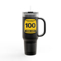 Black travel mug with a yellow label on a white background