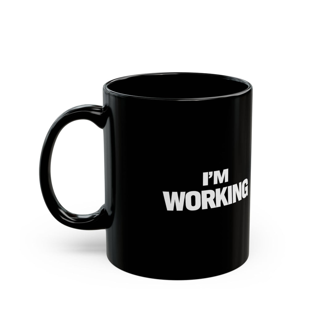 Black mug with 'I'm Working' text on a white background