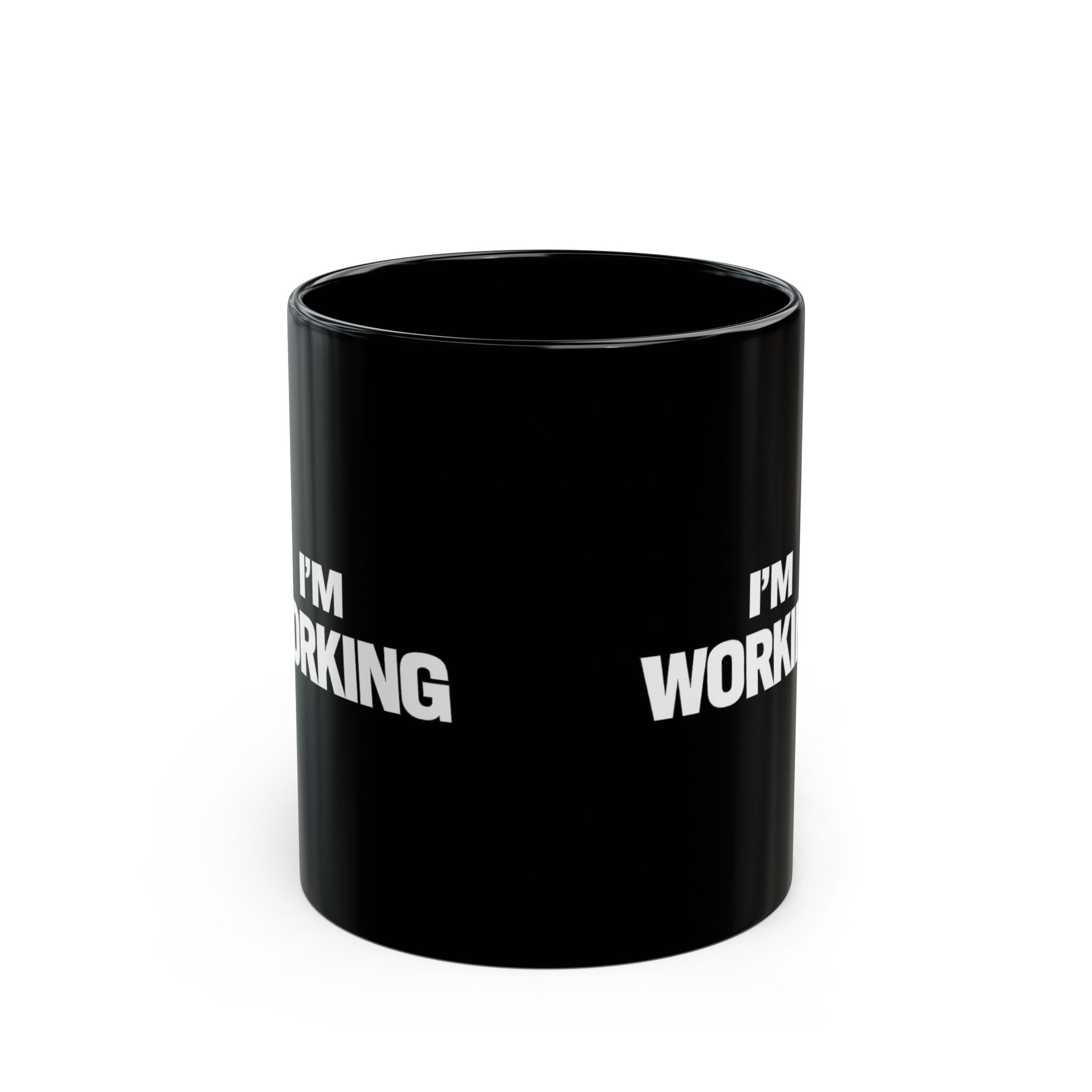 Black mug with 'I'm Working' text on a white background