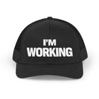 Black cap with 'I'm Working' text on a white background
