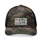 Camouflage cap with 'Execution Beats Excuses' text on a white background