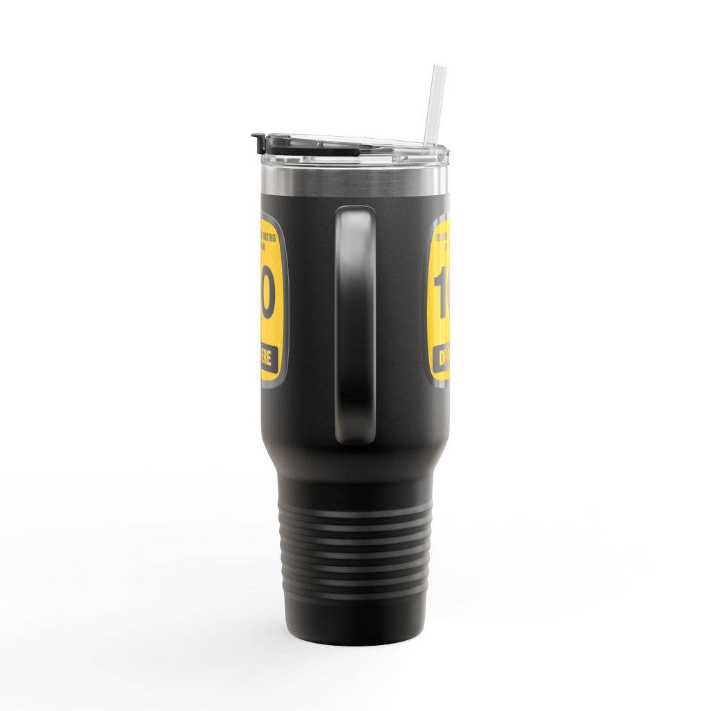 Black tumbler with yellow label on a white background